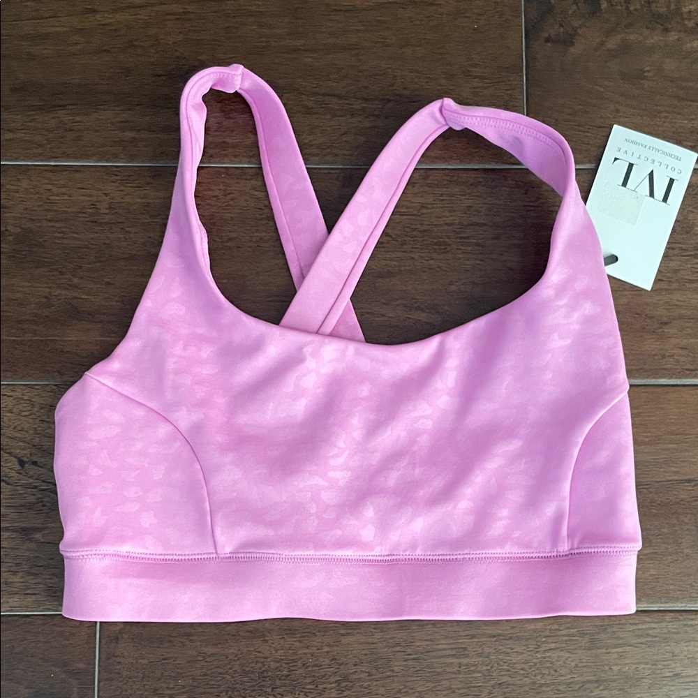 IVL collection cross back sports bra NWT iliac runs small SZ6